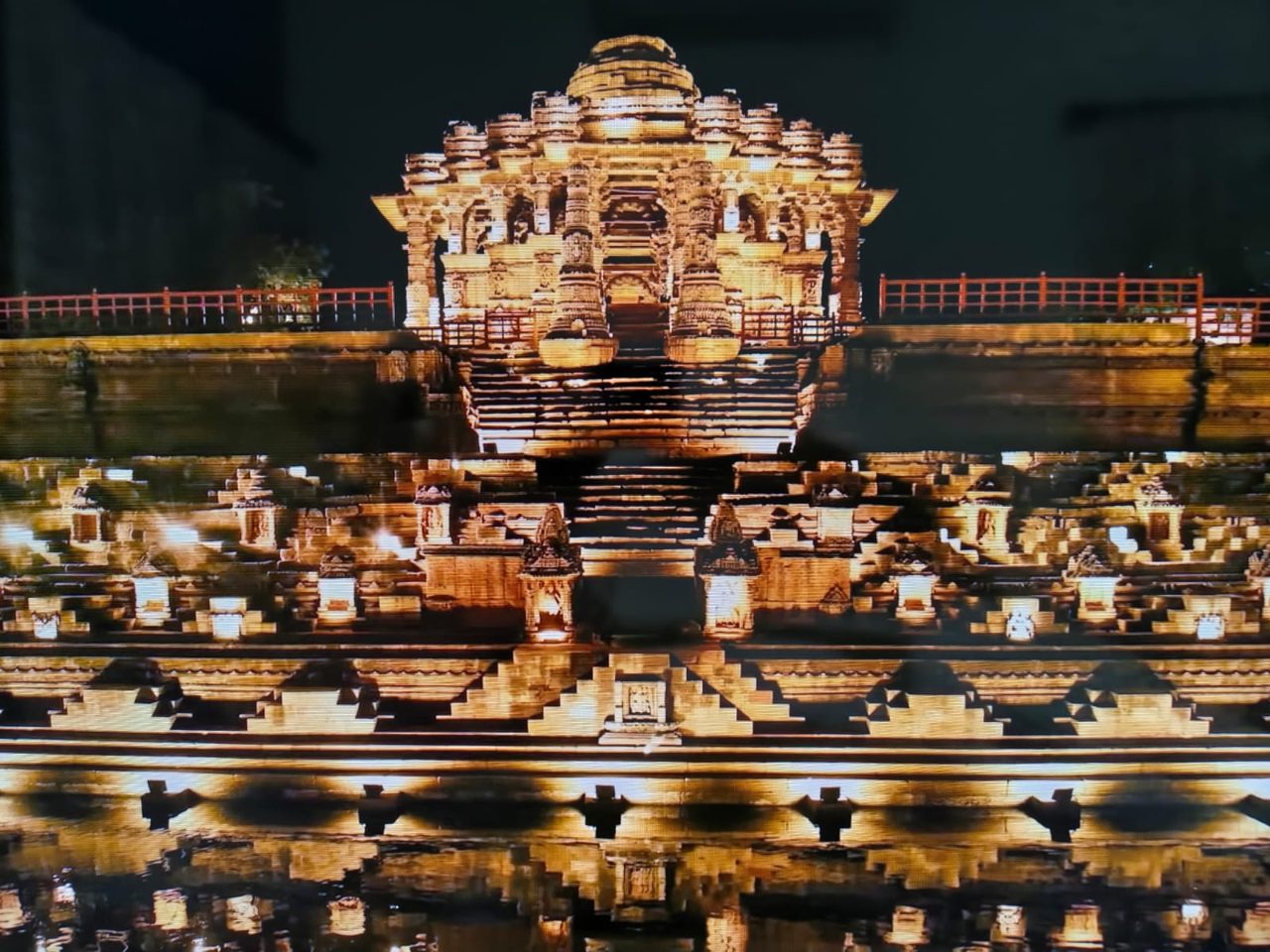 The Sun Temple lit up at night